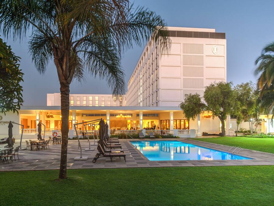 Outdoor pool, pool umbrellas, sun loungers