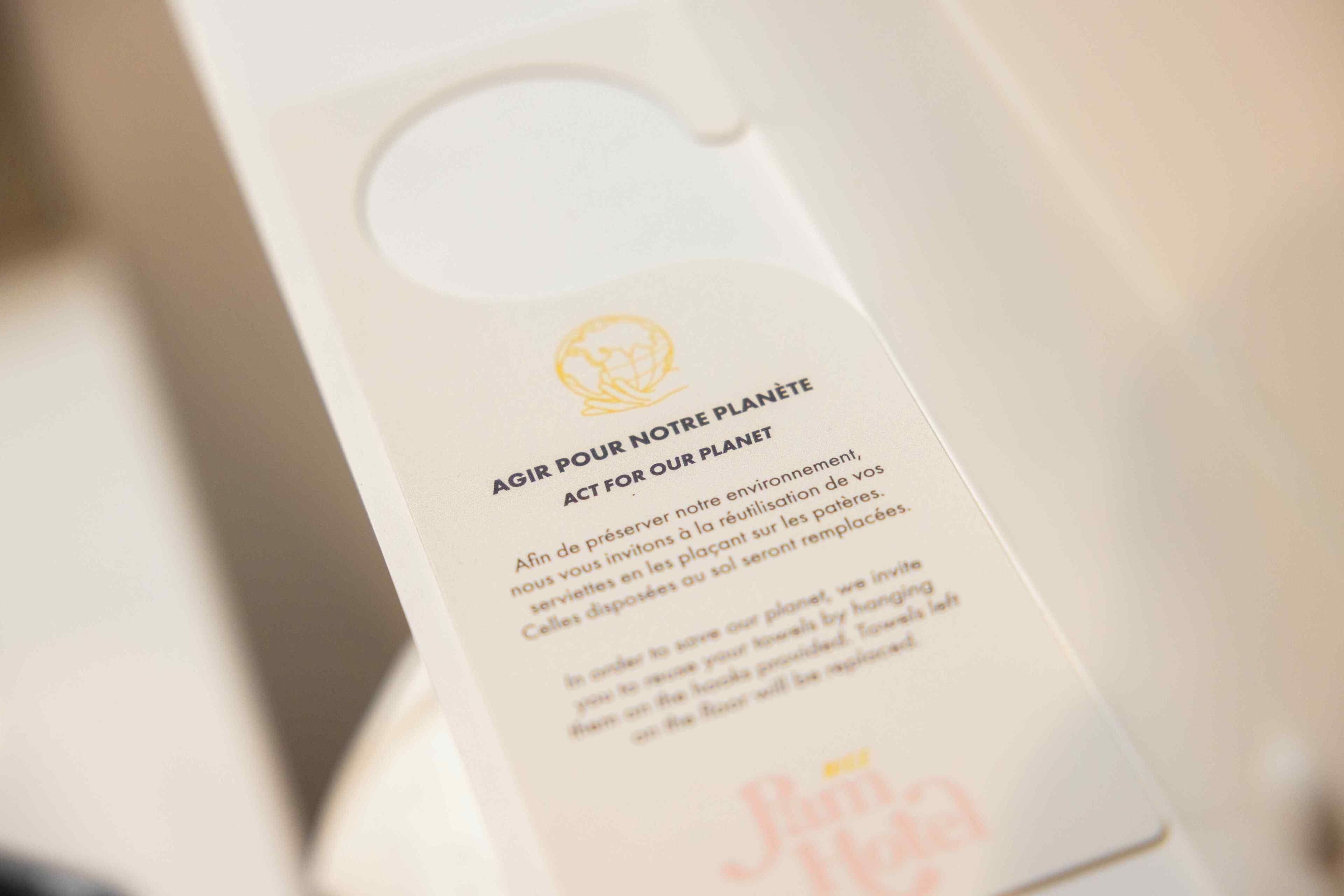 A bottle label with text and a logo.
