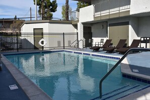 Outdoor pool, pool umbrellas, sun loungers