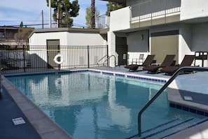 Outdoor pool, pool umbrellas, sun loungers