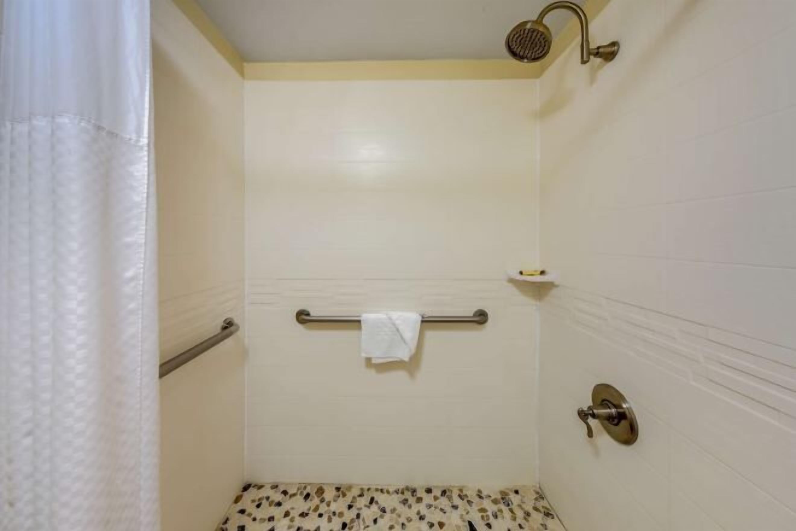 Bathroom | Shower, designer toiletries, hair dryer, towels