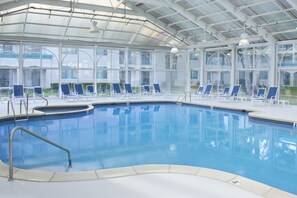 Indoor pool, open 8:00 AM to 10:00 PM, pool loungers