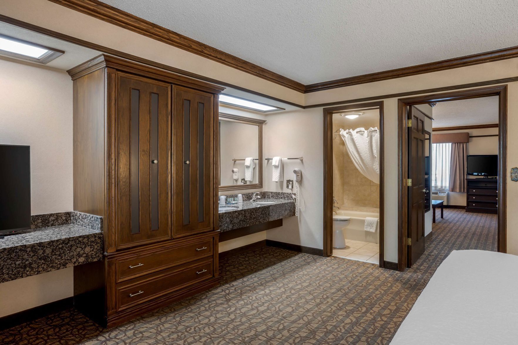 Premium bedding, pillowtop beds, desk, laptop workspace