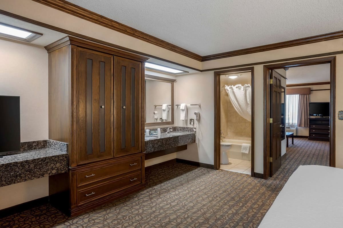 Premium bedding, pillow-top beds, desk, laptop workspace