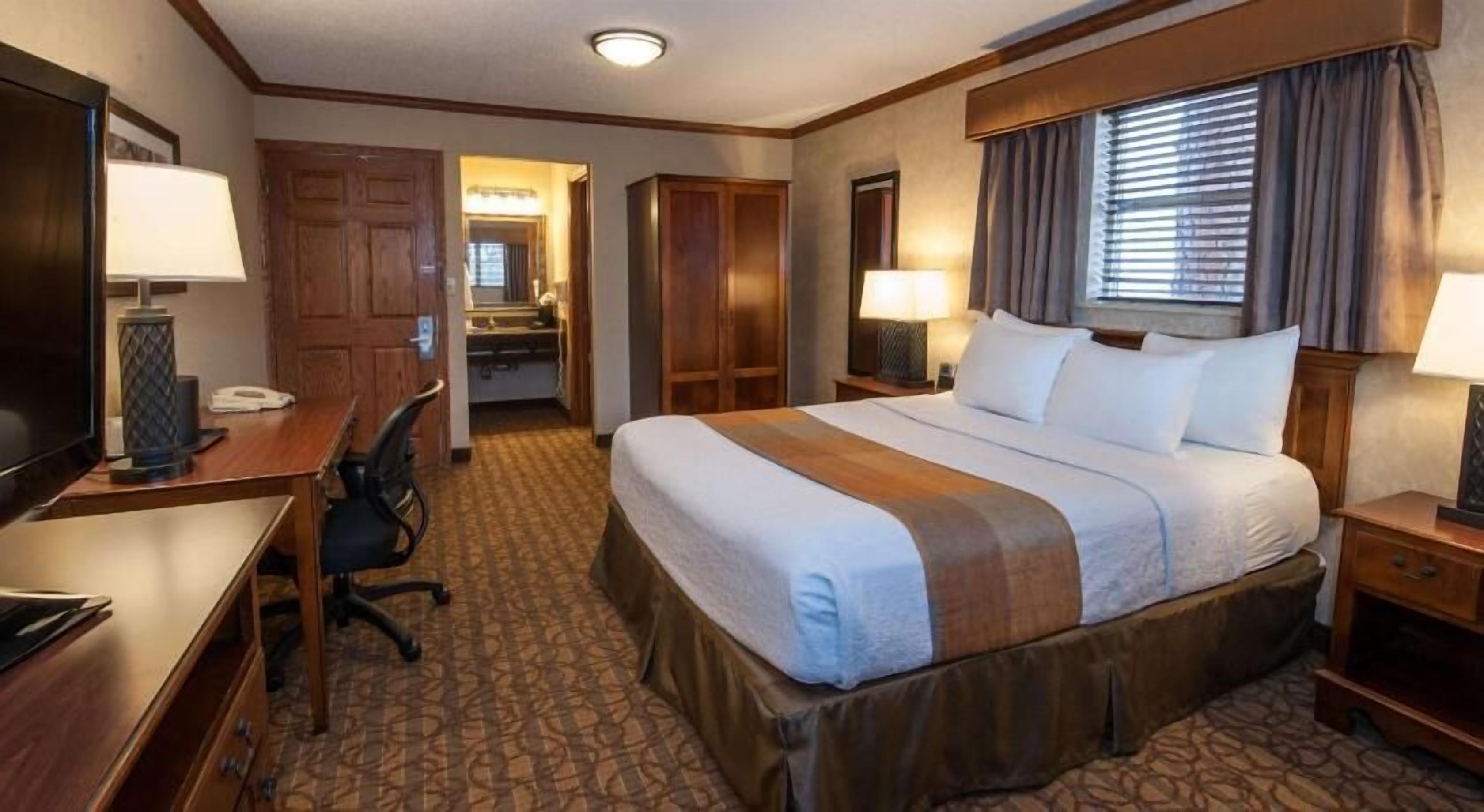 Premium bedding, pillowtop beds, desk, laptop workspace