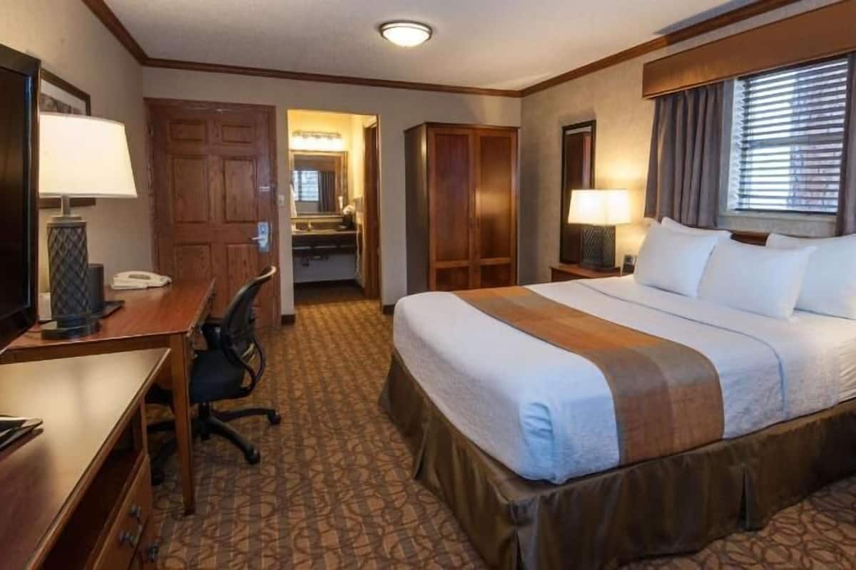 Premium bedding, pillow-top beds, desk, laptop workspace