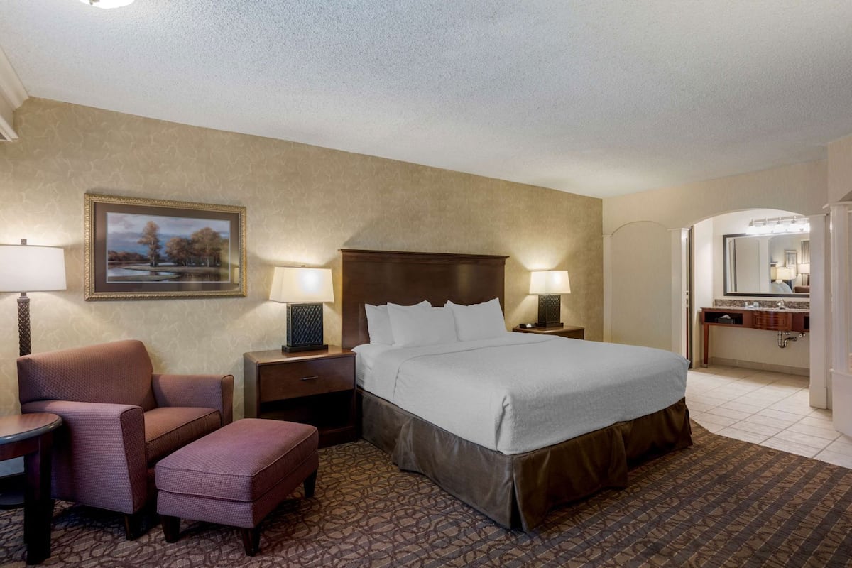 Premium bedding, pillow-top beds, desk, laptop workspace