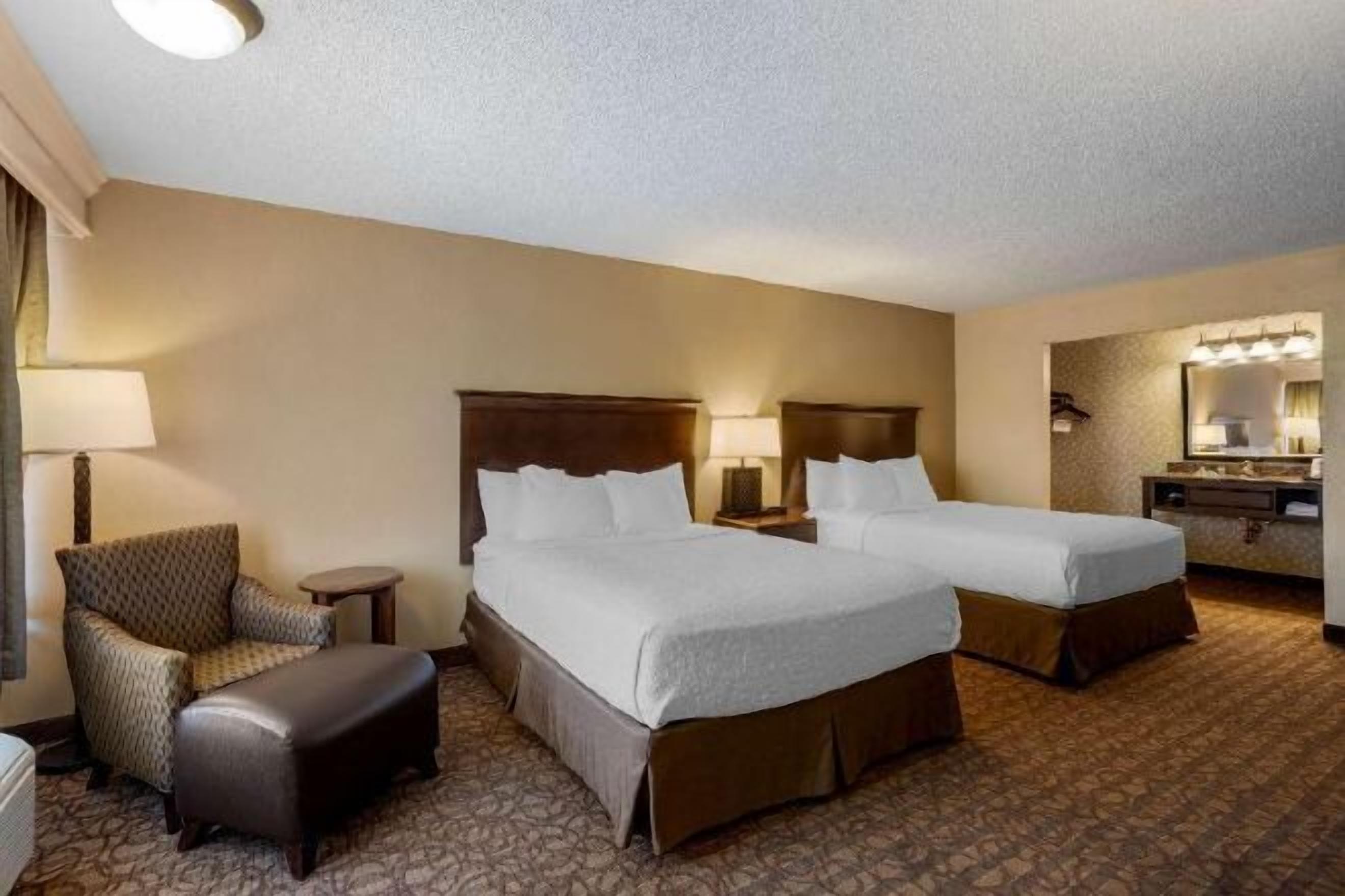 Premium bedding, pillowtop beds, desk, laptop workspace