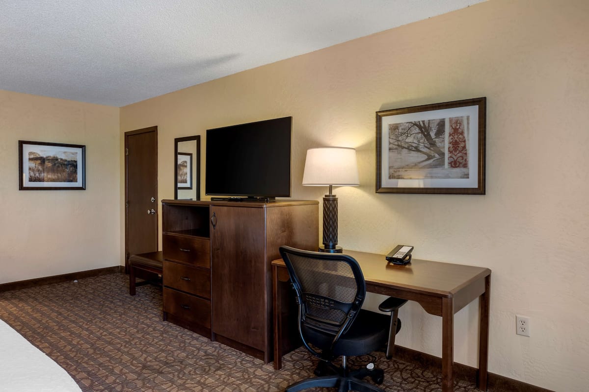 Premium bedding, pillow-top beds, desk, laptop workspace