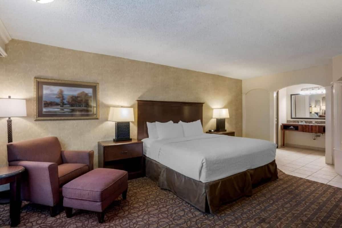 Premium bedding, pillow-top beds, desk, laptop workspace