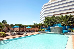 Outdoor pool, pool umbrellas, sun loungers