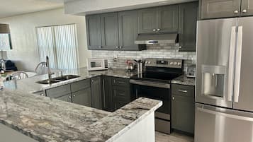 Condo, 2 Bedrooms, 2 Bathrooms | Private kitchen | Full-sized fridge, microwave, stovetop, dishwasher