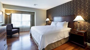 Desk, laptop workspace, blackout drapes, iron/ironing board