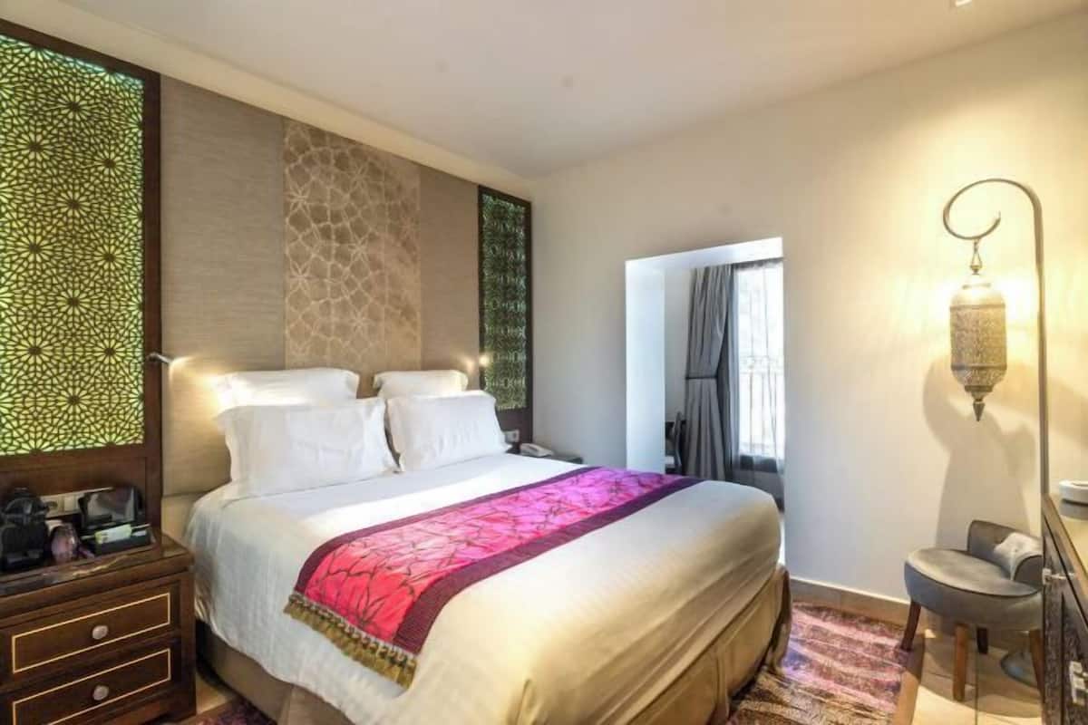 Roupas de cama premium, frigobar (abastecido com alguns itens grátis)