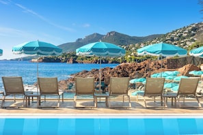 2 outdoor pools, pool umbrellas, sun loungers