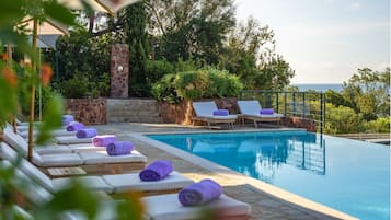 2 outdoor pools, pool umbrellas, sun loungers