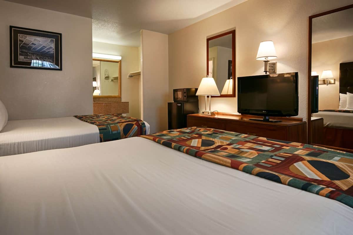 standard room, 2 queen beds, non smoking, refrigerator & microwave | individually decorated, individually furnished, blackout curtains