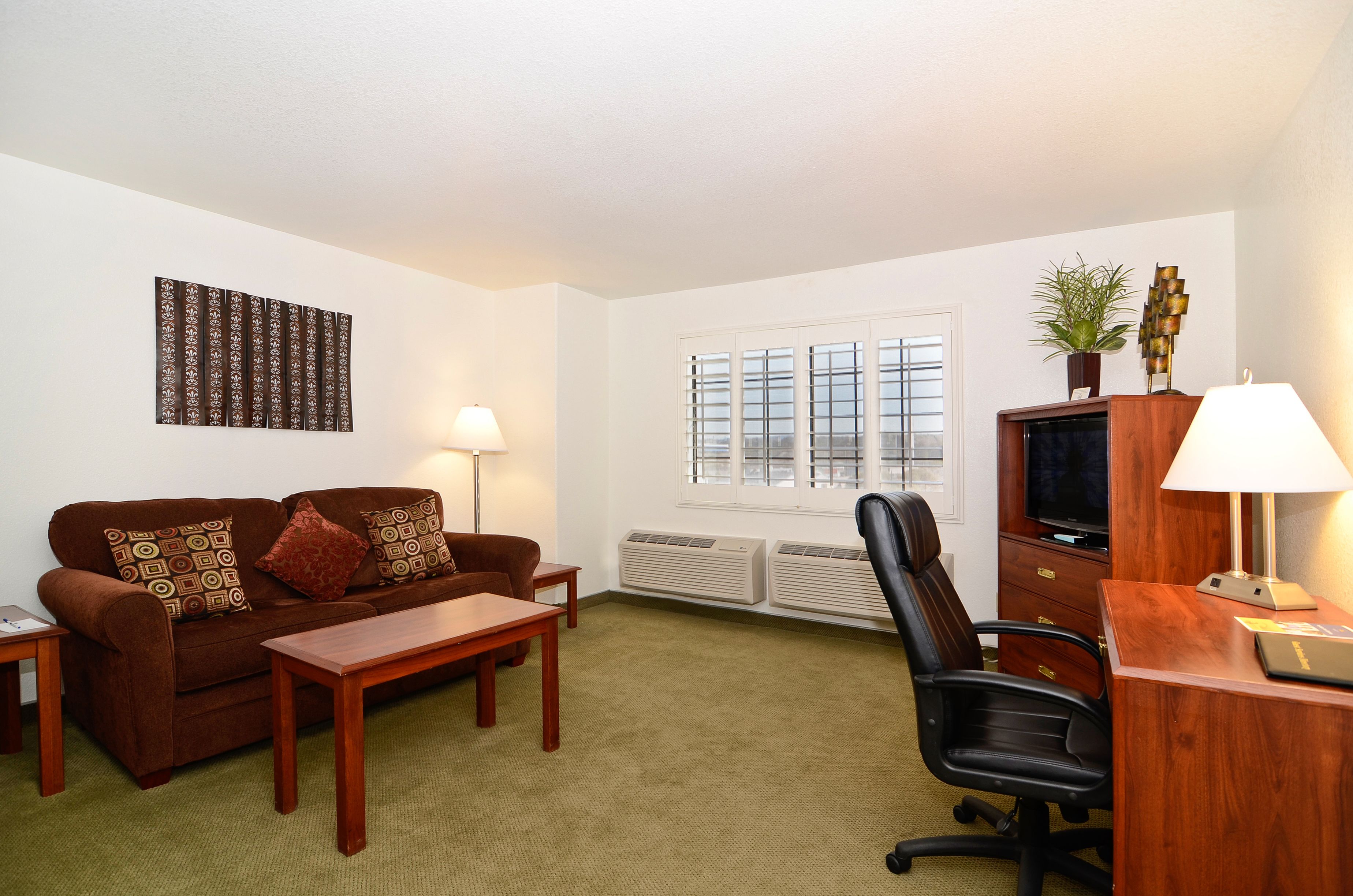 suite, 1 king bed, non smoking, refrigerator & microwave (with sofabed) | living area | flat-screen tv