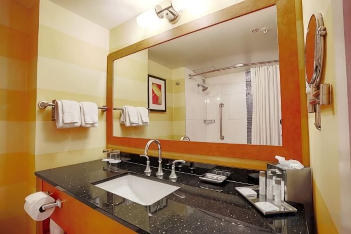 Bathroom | Combined shower/tub, designer toiletries, hair dryer, bathrobes