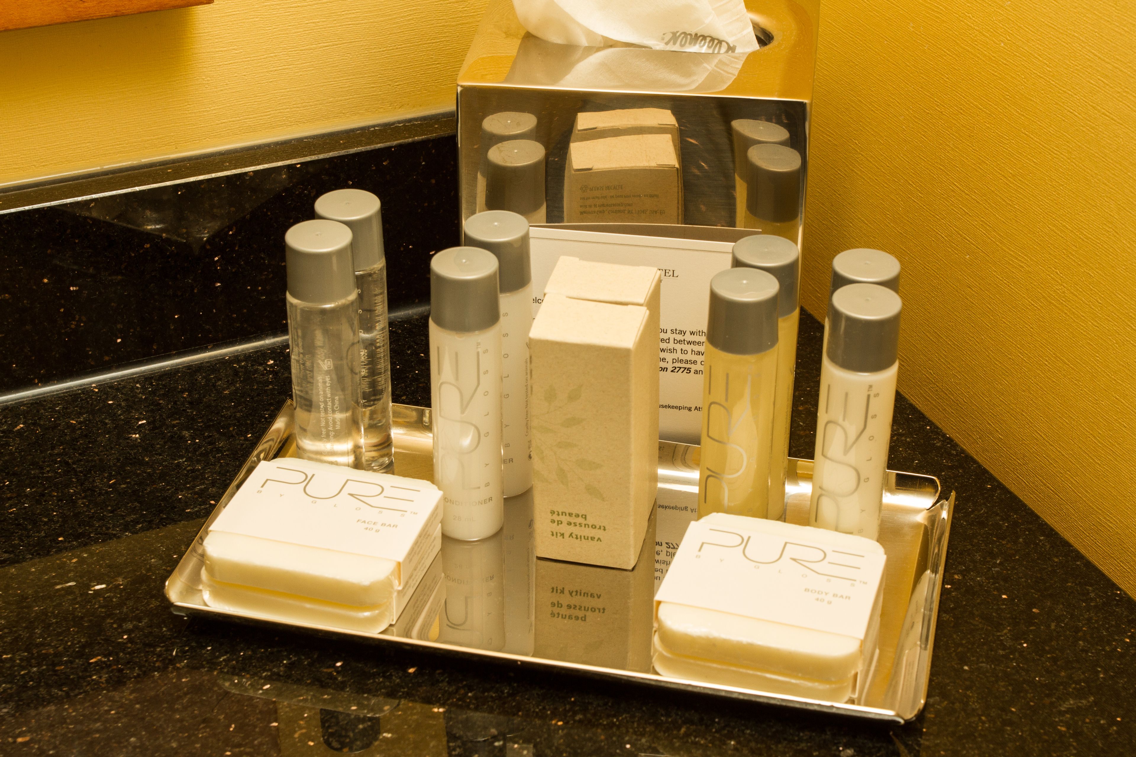 combined shower/bathtub, designer toiletries, hair dryer, towels