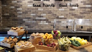 A buffet with various baked goods and fruits. - DoubleTree by Hilton Pomona (Pomona)
