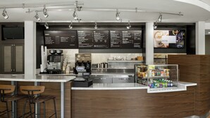 A modern bar area with a coffee machine, menu boards, and a beverage display. - Courtyard by Marriott Santa Rosa (Santa Rosa)