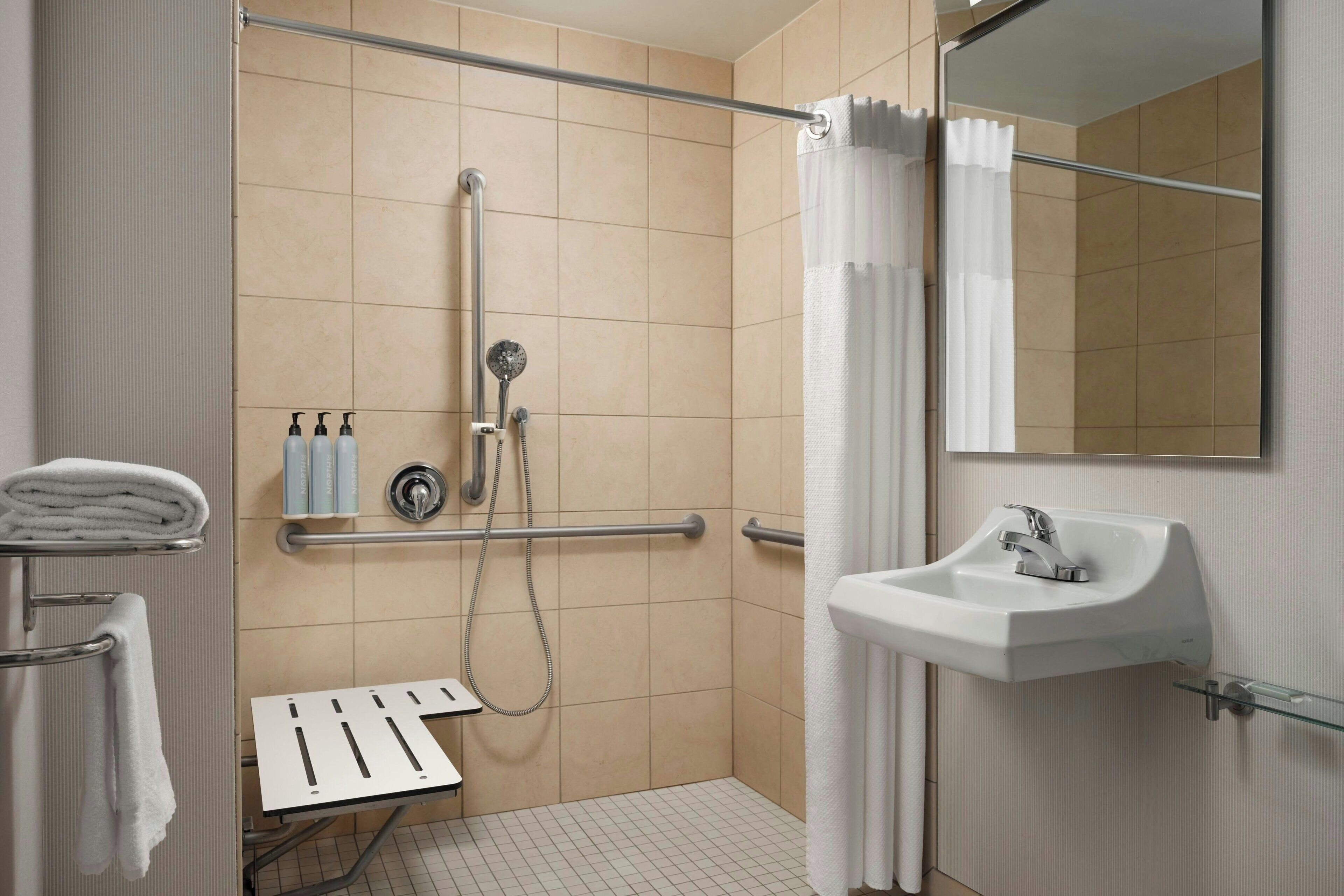 combined shower/bathtub, free toiletries, hair dryer, towels