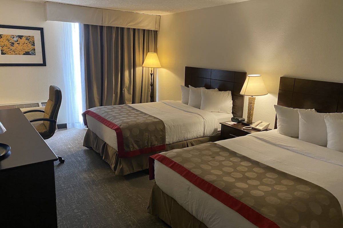 Premium bedding, pillow-top beds, in-room safe, desk