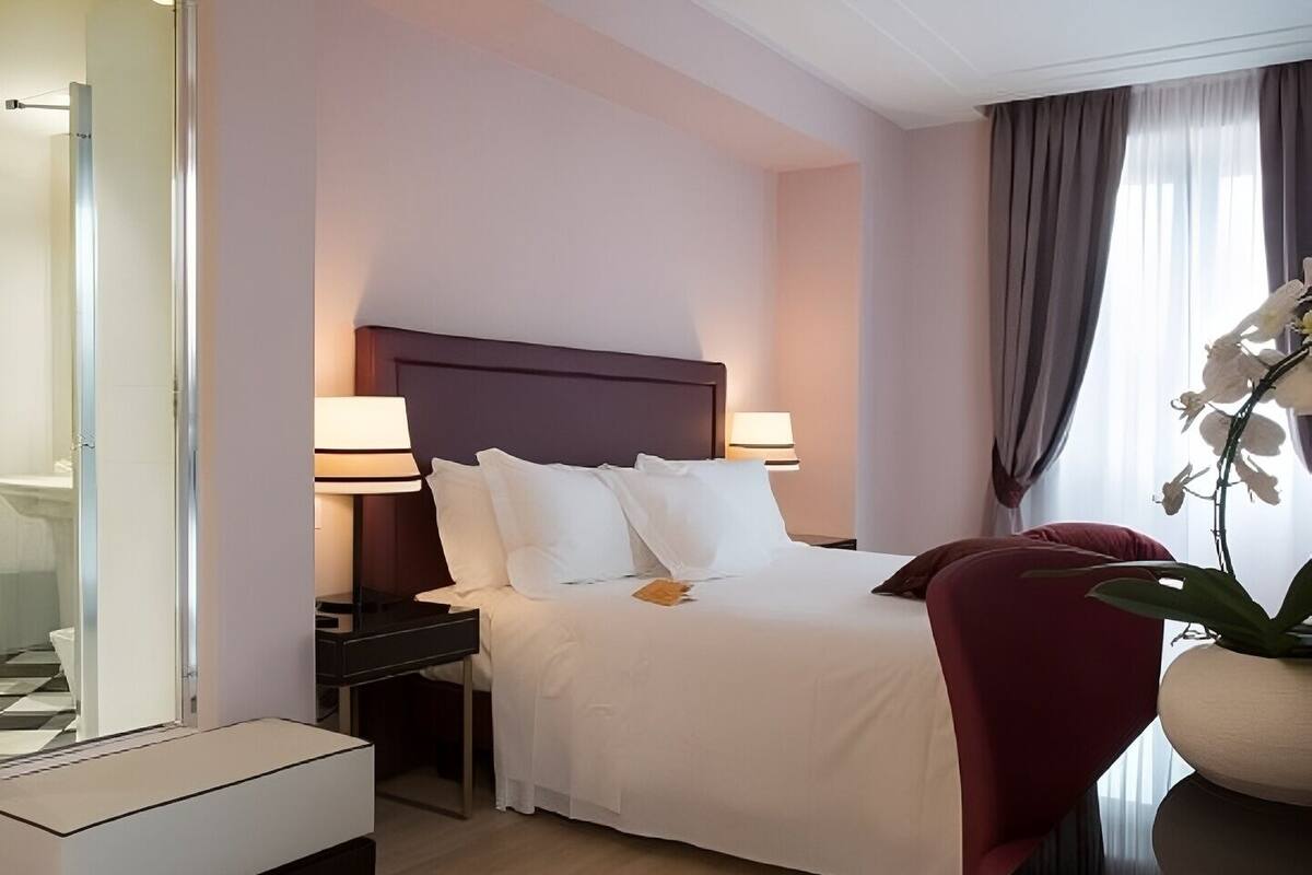 Couette en duvet, minibar contenant certains articles gratuits