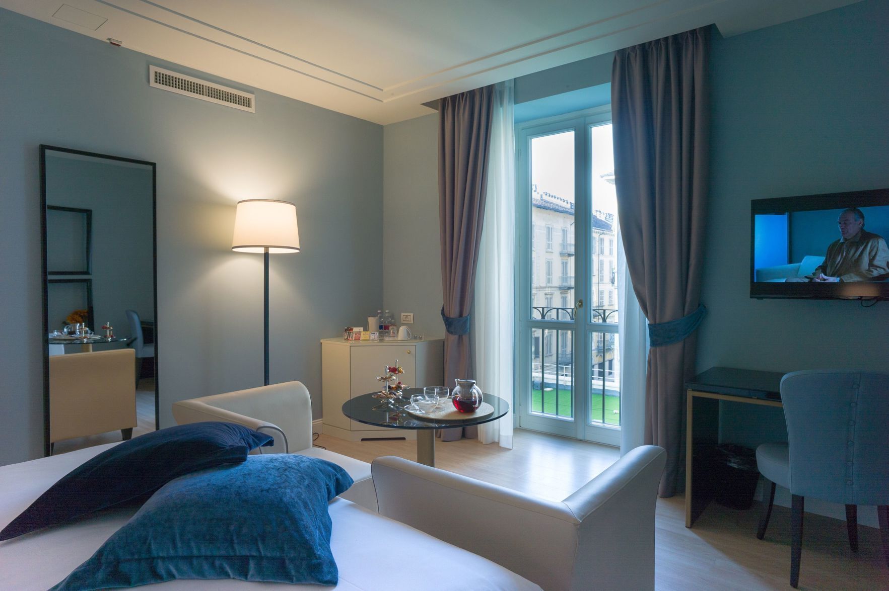 Down comforters, free minibar items, in-room safe, desk