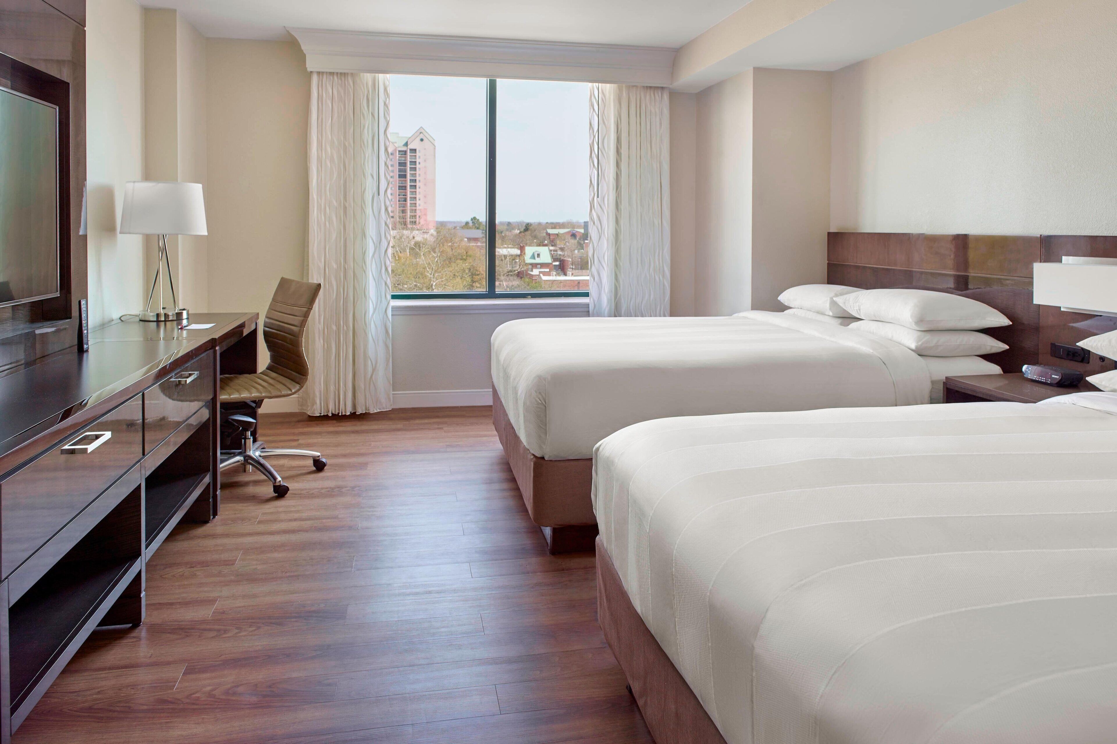 suite, 1 bedroom, non smoking, tower | in-room safe, iron/ironing board, free cots/infant beds