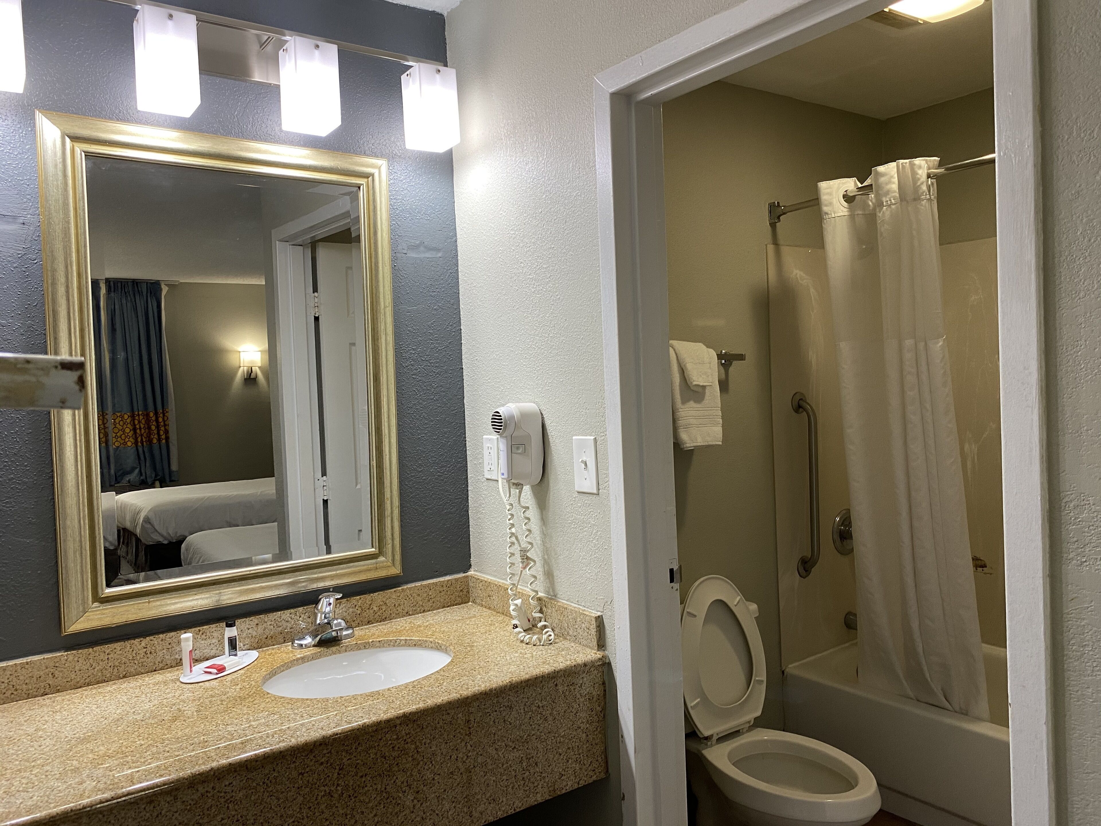 combined shower/bathtub, free toiletries, hair dryer, towels