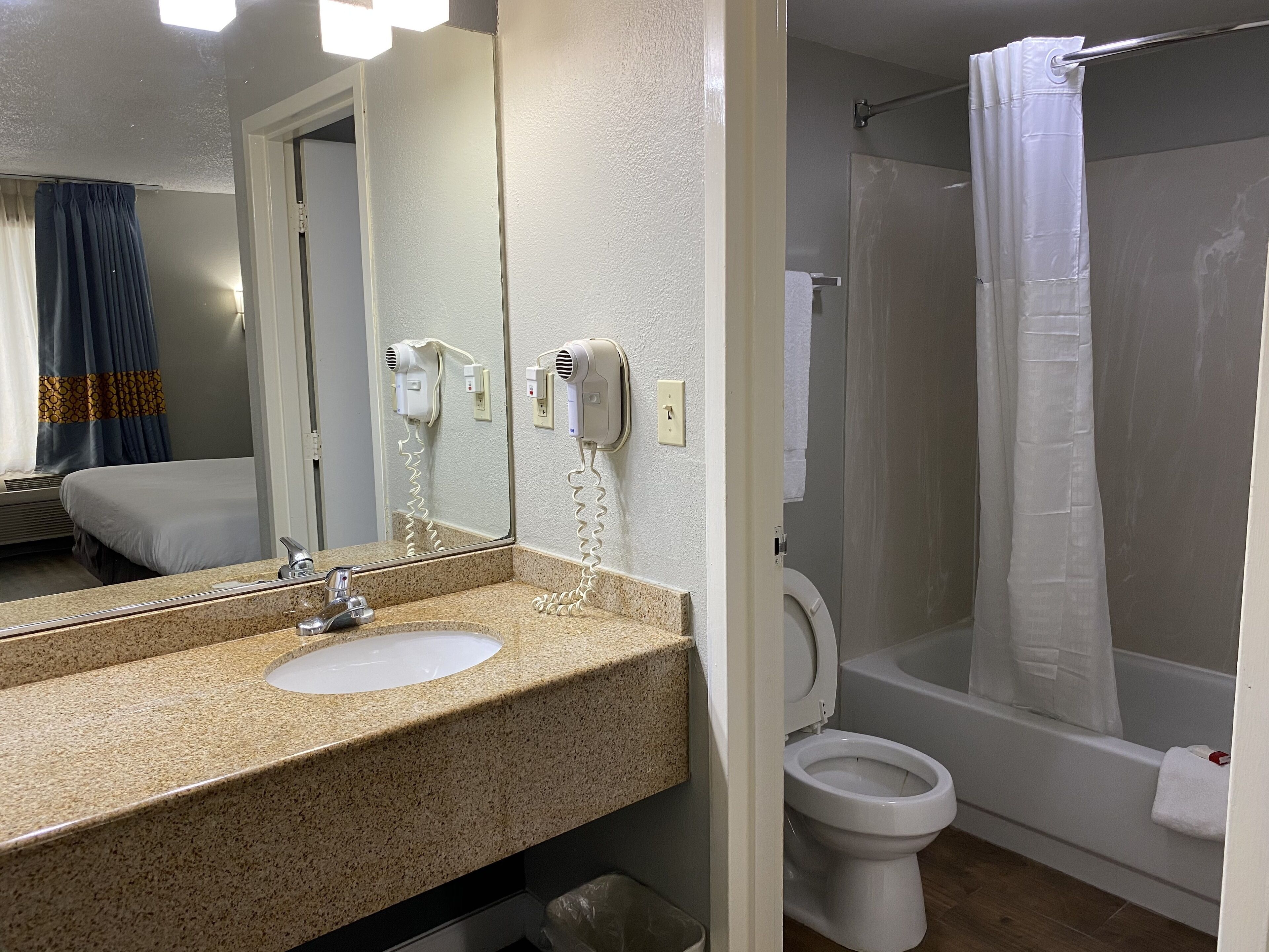 combined shower/bathtub, free toiletries, hair dryer, towels