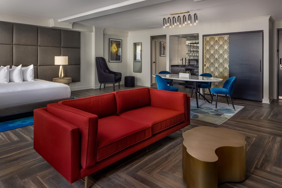 Presidential Suite, 1 King Bed | Living area | 52-inch flat-screen TV with cable channels, TV, stereo