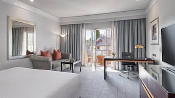 Premium bedding, pillow-top beds, minibar, in-room safe