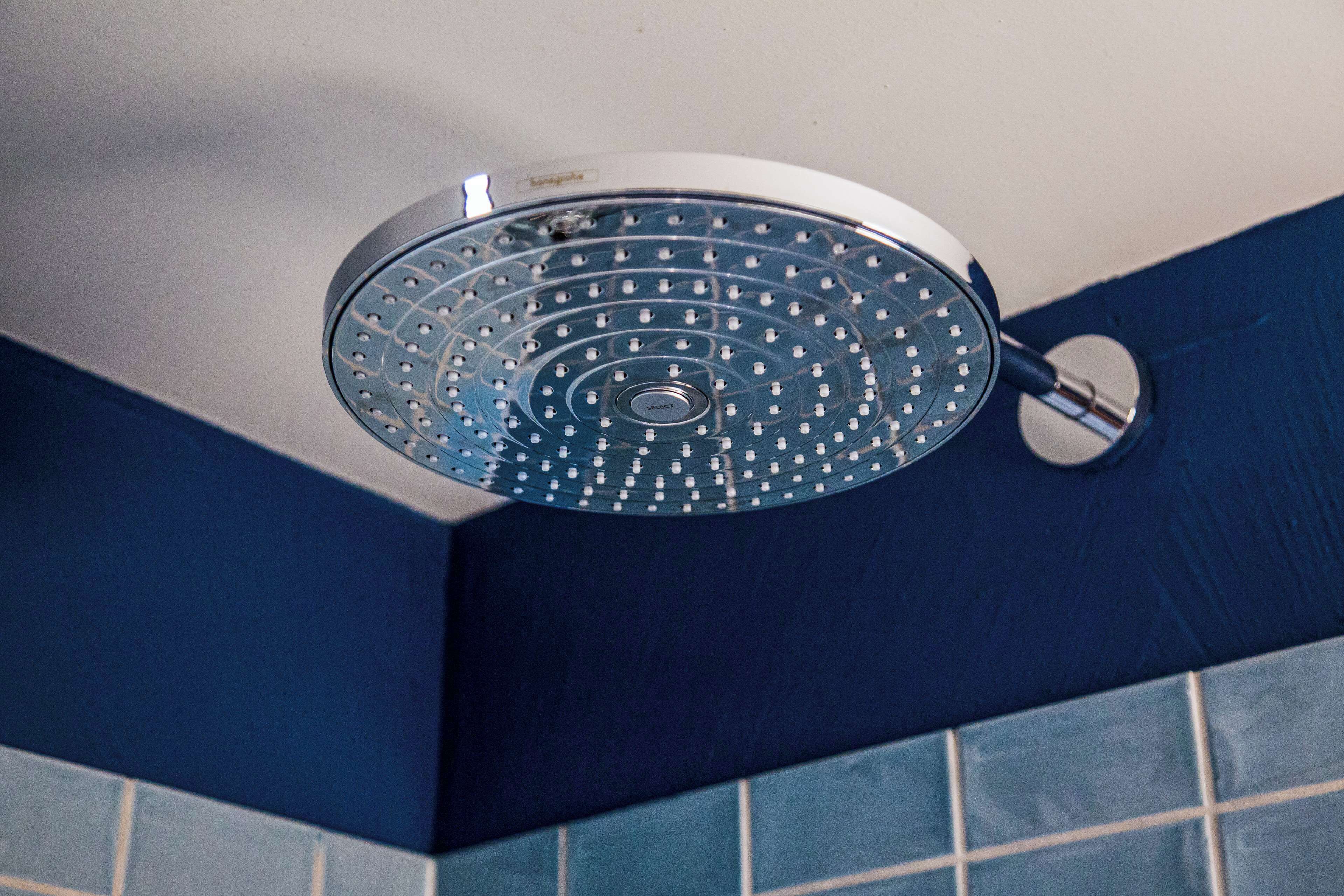 rainfall showerhead, eco-friendly toiletries, hair dryer, towels