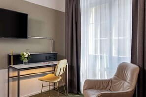 Ropa de cama de alta calidad y minibar 