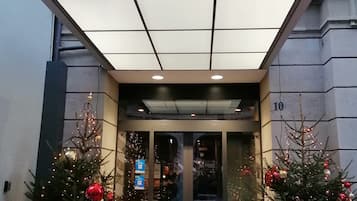 Welcome to The Bristol, a hotel with a modern entrance featuring a large glass door and a prominent sign.
