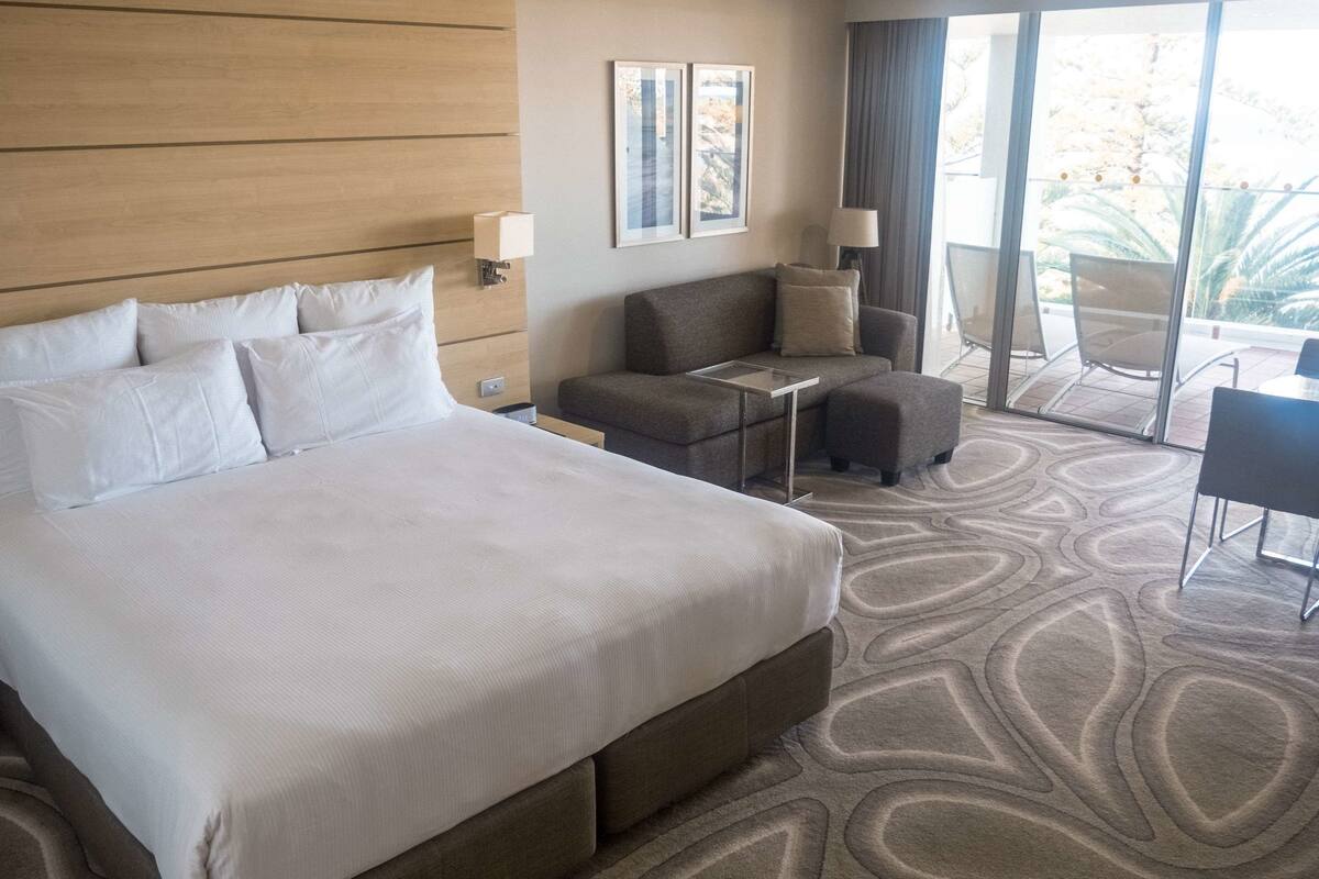 beachfront suite, 1 king bed with sofa bed | 1 bedroom, premium bedding, pillow-top beds, in-room safe