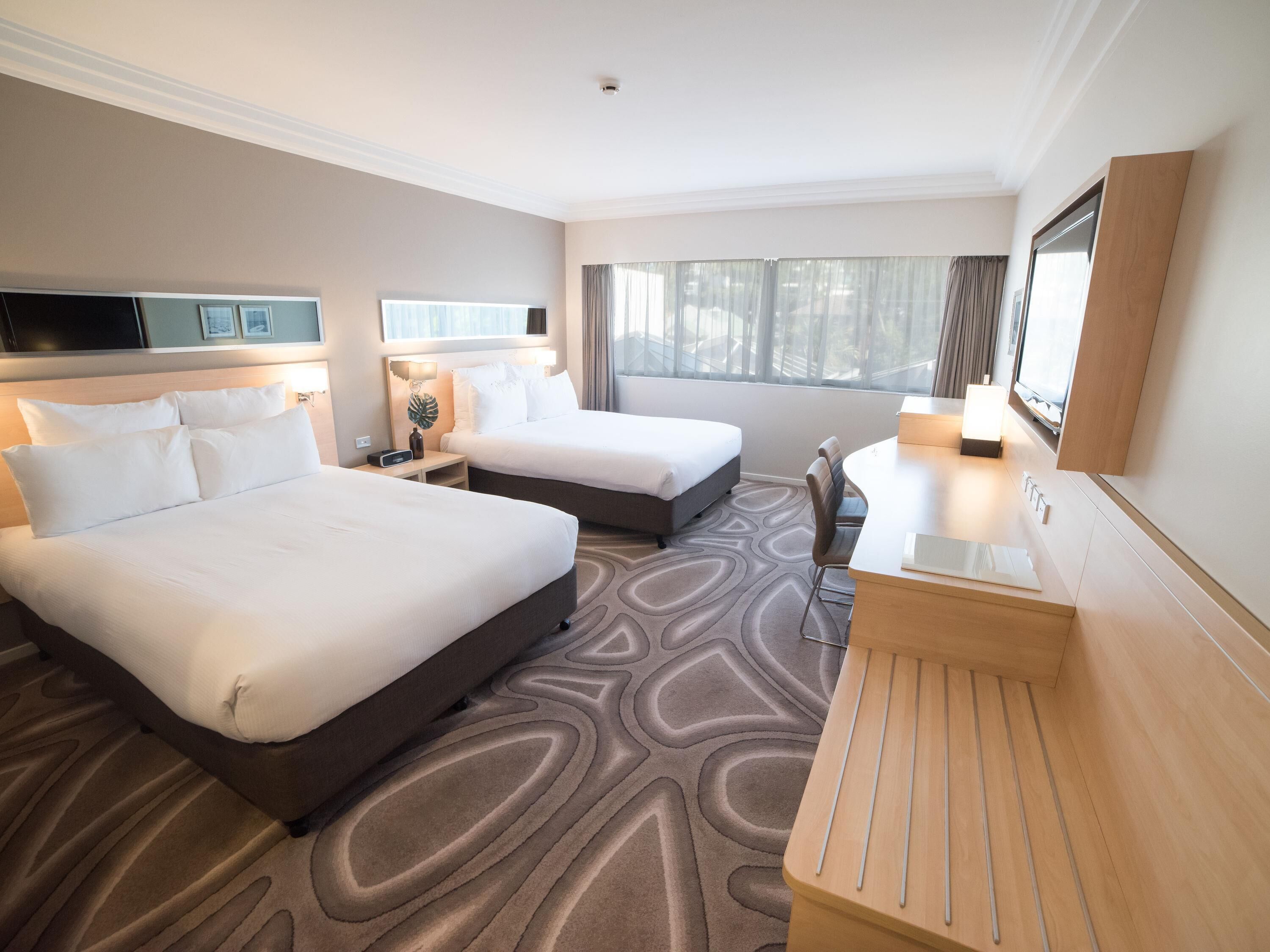 Room, 2 Queen Beds, City View | Premium bedding, pillowtop beds, in-room safe, desk