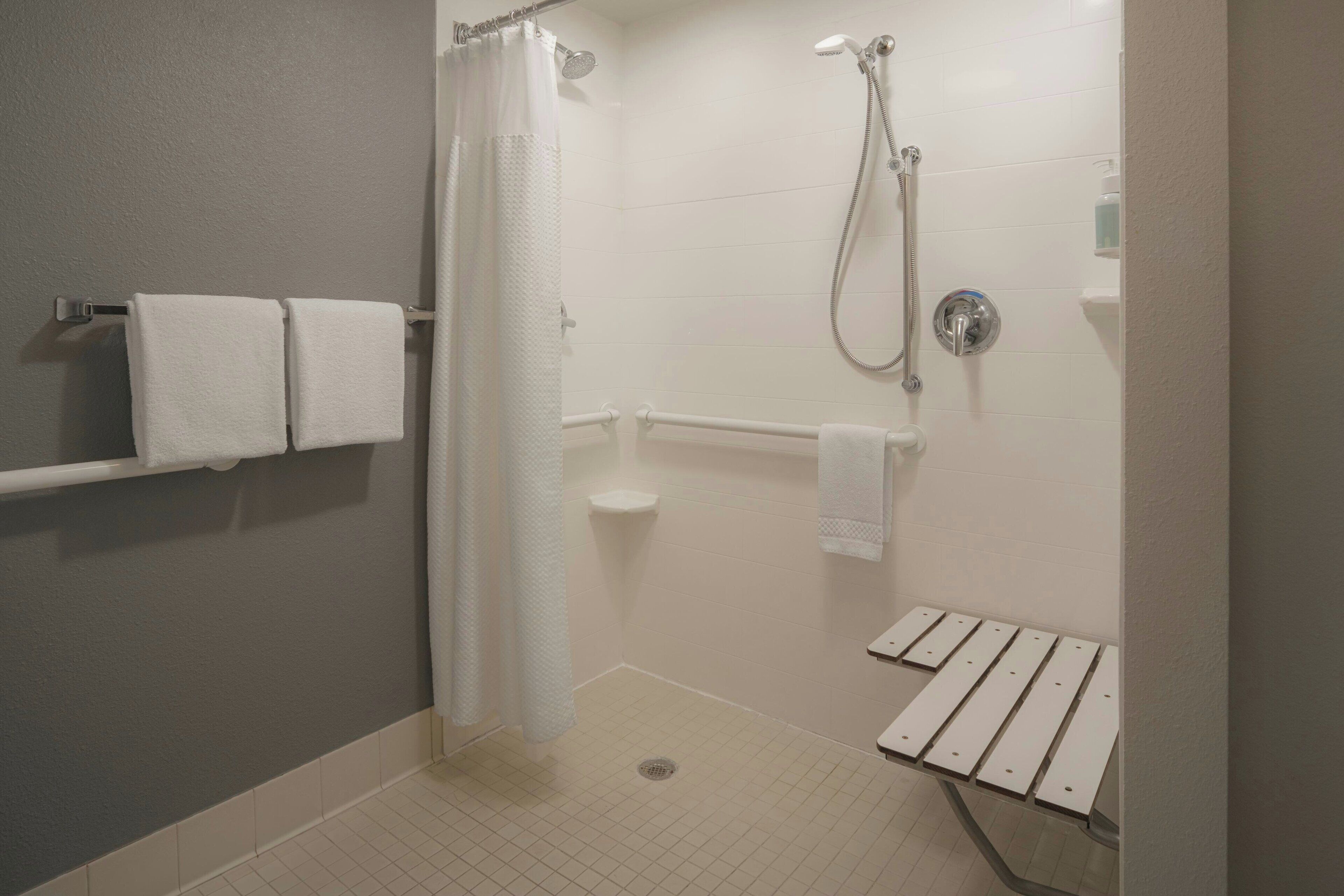 combined shower/bathtub, free toiletries, hair dryer, towels