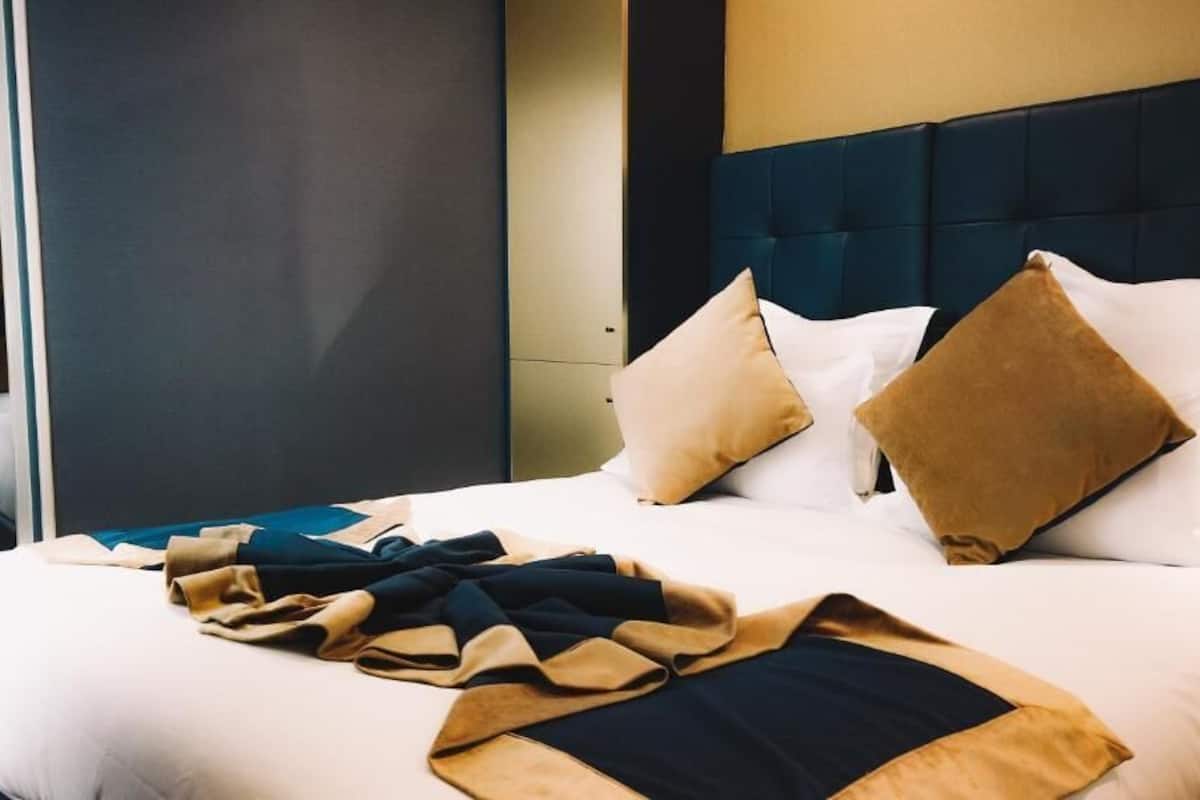 Ropa de cama de alta calidad y minibar