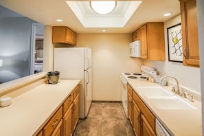 Deluxe Room, 1 Bedroom | Private kitchen | Fridge, microwave, coffee/tea maker