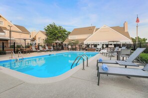Seasonal outdoor pool, pool loungers