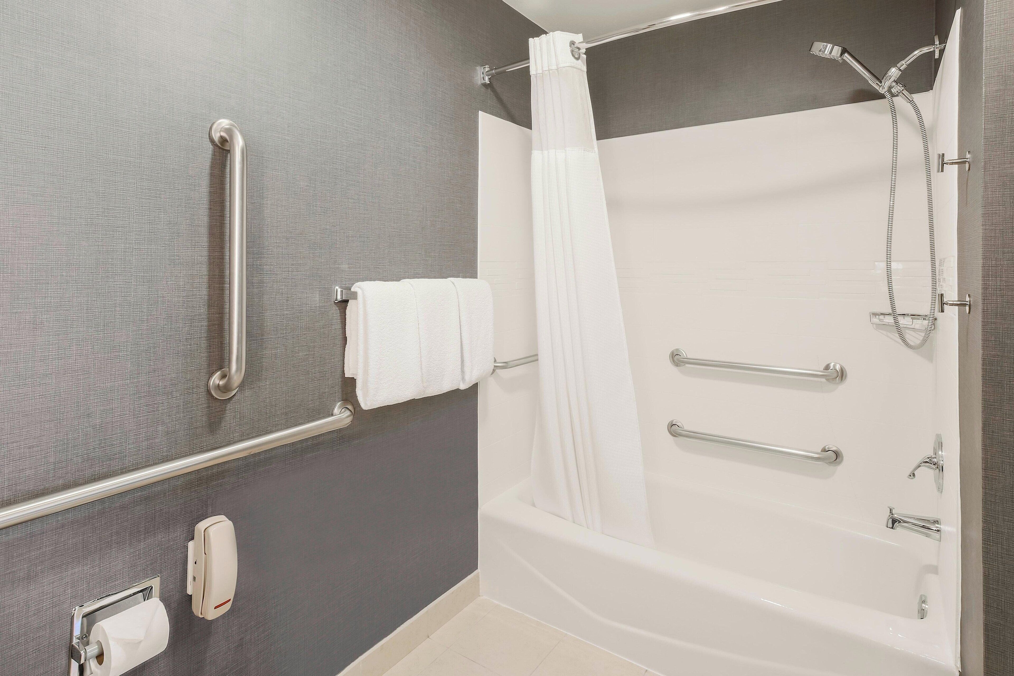 combined shower/bathtub, free toiletries, hair dryer, towels