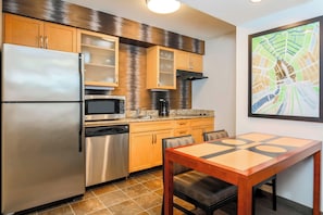 Full-sized fridge, microwave, stovetop, dishwasher