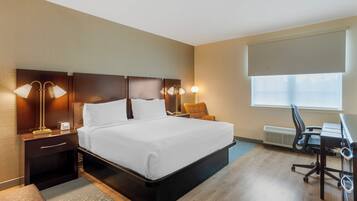 Standard Room, 1 King Bed (Mobility/Hearing Access, Roll-in Shwr) | Pillowtop beds, in-room safe, iron/ironing board, WiFi (free)