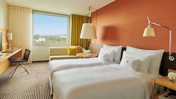 Habitación clásica | Ropa de cama de alta calidad y minibar