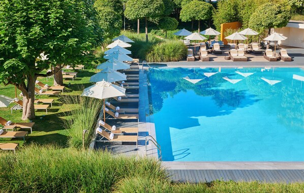Seasonal outdoor pool, pool umbrellas, pool loungers