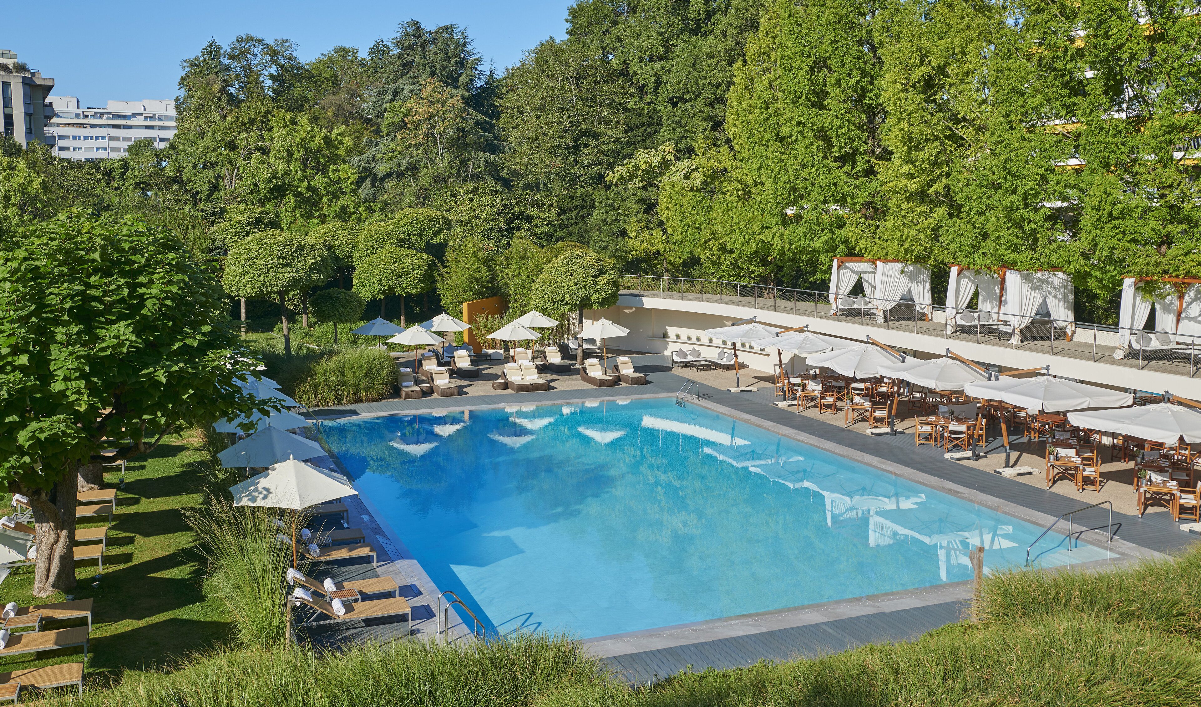 seasonal outdoor pool, pool umbrellas, pool loungers